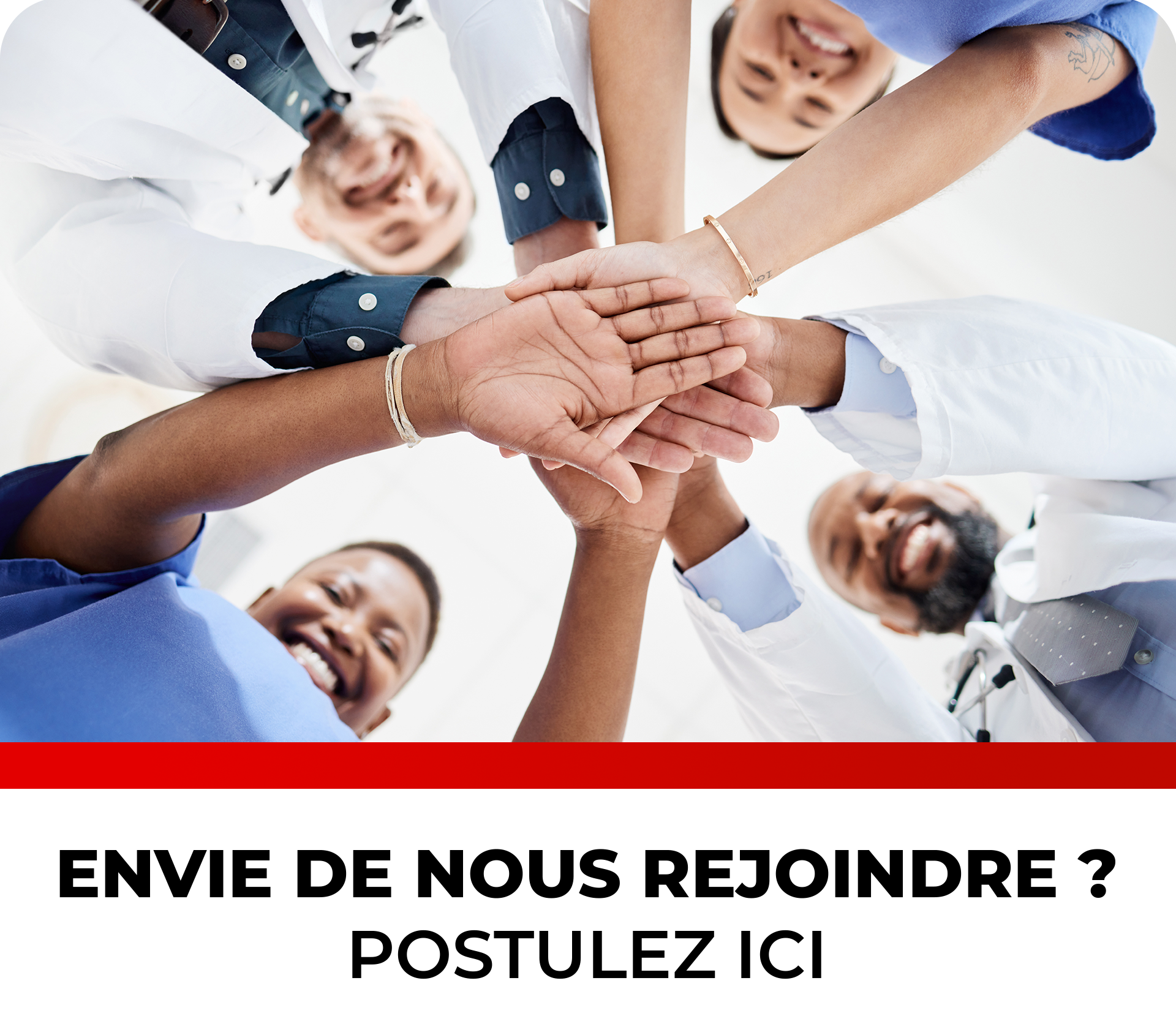 Group of medical professionals stacking hands in teamwork